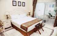 Bilik Tidur 5 Flamingo Suites Boutique Hotel