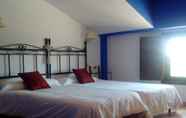 Bilik Tidur 3 Hosteria Tierrallana by Juypehotel