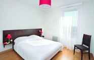 Bedroom 3 Appart'City Confort Toulouse Aéroport Cornebarrieu