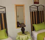 Kamar Tidur 5 Airport Modjadji Guesthouse