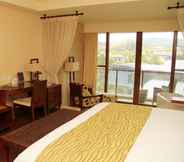 Kamar Tidur 4 New Century Resort Jiu Long Lake Ningbo