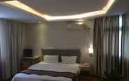 Bedroom 3 Guangzhou Minghong Hotel -Xiwan