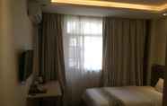 ห้องนอน 2 Guangzhou Minghong Hotel -Xiwan