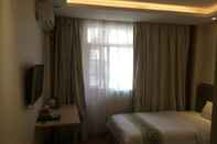 Bedroom Guangzhou Minghong Hotel -Xiwan