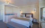 ห้องนอน 4 Silver Fern Rotorua Suites & Spa