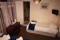 ห้องนอน Westgate Hotel