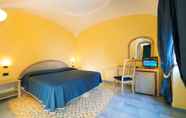 Bilik Tidur 4 Hotel Oasi Castiglione