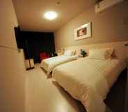 Bedroom 7 Jinjiang Inn Xiangzhou Lovers Road C