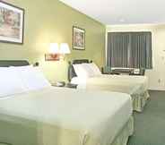 Kamar Tidur 6 Days Inn by Wyndham El Campo TX