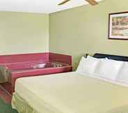 Kamar Tidur 7 Days Inn by Wyndham El Campo TX