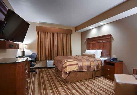 Bedroom Best Western Premier KC Speedway Inn & Suites