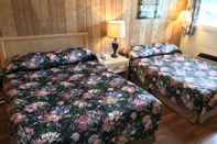 ห้องนอน Lake City Motel