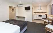 Kamar Tidur 5 Country Comfort Amity Motel