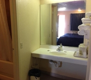 In-room Bathroom 6 Super 7 Inn Siloam Springs