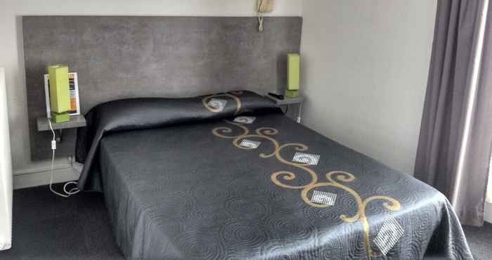 Kamar Tidur Acqs Hôtel