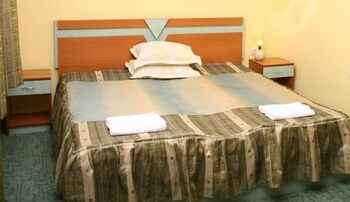 Kamar Tidur 4 Hotel Alpha