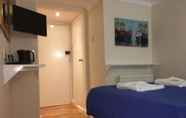 Kamar Tidur 2 King's Cross Hotel