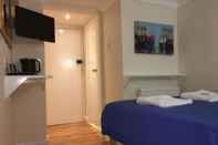 Kamar Tidur King's Cross Hotel