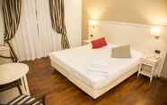 Bedroom 2 Inn Rome Rooms & Suites