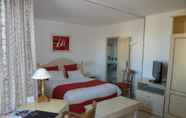 ห้องนอน 5 Best Western Gemenos en Provence