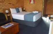 Bedroom 4 Royal Palms Motor Inn