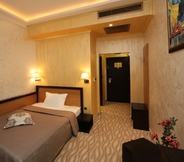 Kamar Tidur 5 EfBet Hotel