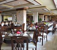 Restaurant 2 Amra Palace International Hotel