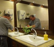 In-room Bathroom 3 Amra Palace International Hotel