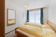 ห้องนอน Serviced Apartments – Kirchbühl at Home