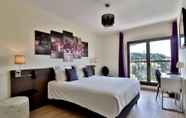 Phòng ngủ 3 Hotel Perla Riviera