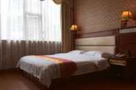 Bedroom Hengdong Business Hotel - Guangzhou