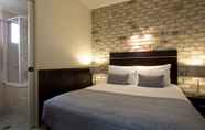 Kamar Tidur 4 Highlander Motor Inn & Apartments