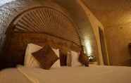 Kamar Tidur 6 Roma Cave Suite Hotel