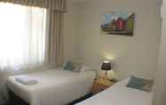 Bedroom 7 Beaches Serviced Apartments