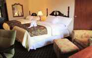 Bedroom 5 Arbors at Island Landing Hotel & Suites