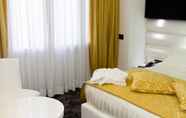 Kamar Tidur 4 Style Hotel