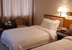 침실 6 The Overseas Chinese Building Hotel