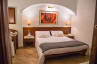 Kamar Tidur Palmed Hotel