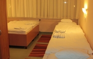 Kamar Tidur 5 Tisza Corner Hotel