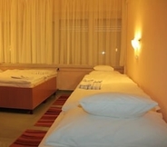 Bedroom 4 Tisza Corner Hotel