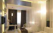 Bedroom 5 BluPetal - A Business Hotel