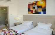 Bedroom 4 Frixos Suites Hotel Apts