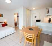 Bedroom 2 All Suites Appart Hotel Merignac