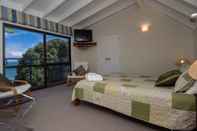 Bedroom By the Bay Beachfront Apartments