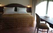 Kamar Tidur 5 Hotel Cascina Canova