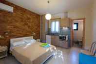 Kamar Tidur Holiday Rooms