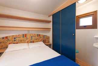 Bedroom 4 Camping Village Mare Pineta Baia Sistiana