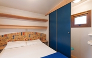 Bedroom 2 Camping Village Mare Pineta Baia Sistiana