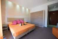 Kamar Tidur Hotel Club Poseidone Beach Resort