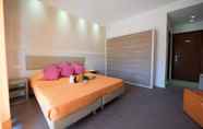 Kamar Tidur 4 Hotel Club Poseidone Beach Resort